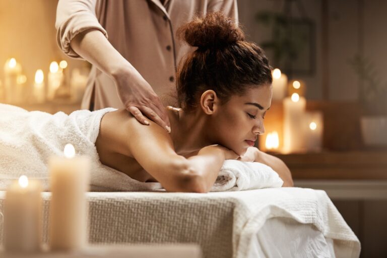 tender-african-woman-smiling-enjoying-massage-with-closed-eyes-spa-resort (1)